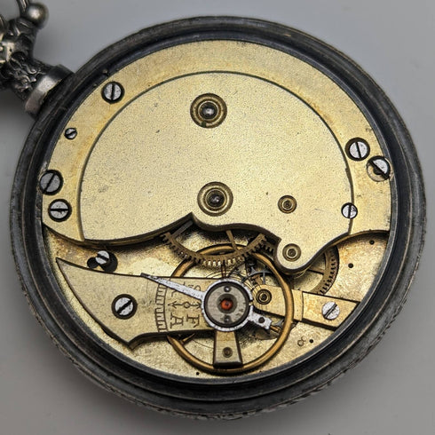 Antique Swiss made unsigned pocket watch with embossed silver plate case works well